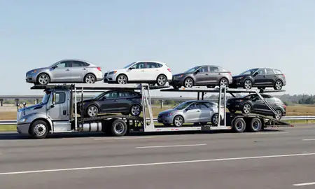Multi-level car carrier on the highway to Kannapolis, North Carolina, United States