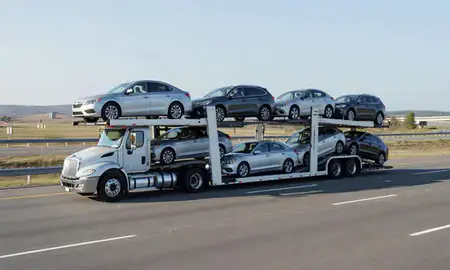 Multi-level car carrier on the highway to Rocky Mount, North Carolina, United States