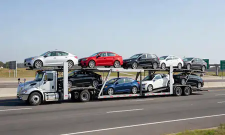 Multi-level car carrier on the highway to Wake Forest, North Carolina, United States
