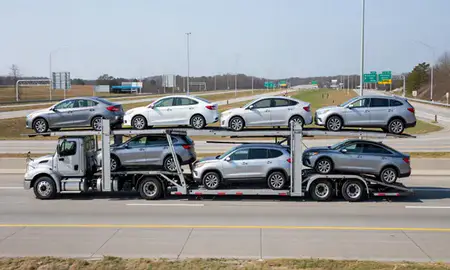 Multi-level car carrier on the highway to Wilson, North Carolina, United States