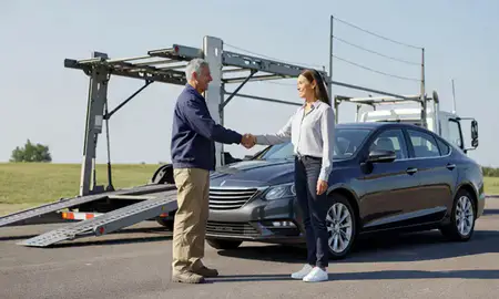 Vehicle owner beside their delivered car in Wilson, North Carolina, United States