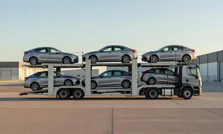 Car transporter parked in an industrial area of Beulah, North Dakota, United States