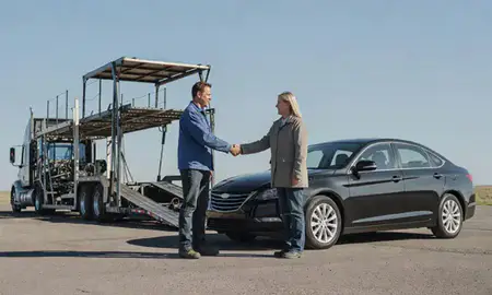 Vehicle owner beside their delivered car in Casselton, North Dakota, United States