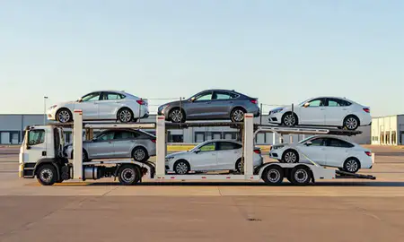 Car transporter parked in an industrial area of Grand Forks, North Dakota, United States