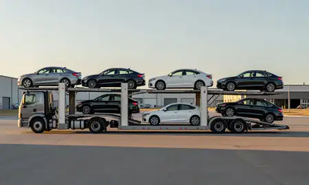 Car transporter parked in an industrial area of Jamestown, North Dakota, United States