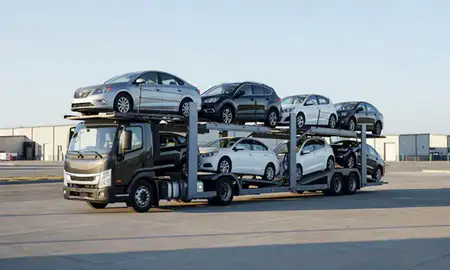 Car transporter loaded with vehicles in Jamestown, North Dakota, United States