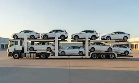 Car transporter parked in an industrial area of Lisbon, North Dakota, United States
