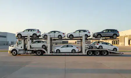 Car transporter parked in an industrial area of Mandan, North Dakota, United States