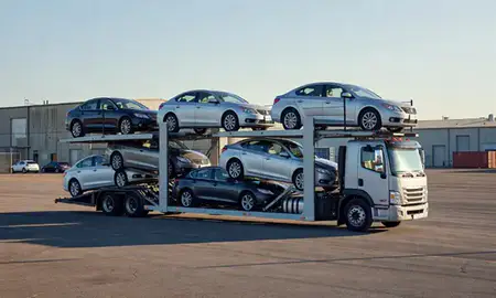 Car transporter loaded with vehicles in Stanley, North Dakota, United States
