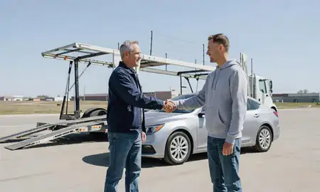 Vehicle owner beside their delivered car in Wahpeton, North Dakota, United States