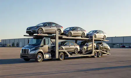 Car transporter loaded with vehicles in Wahpeton, North Dakota, United States