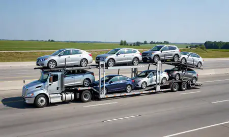 Multi-level car carrier on the highway to Ohio, United States