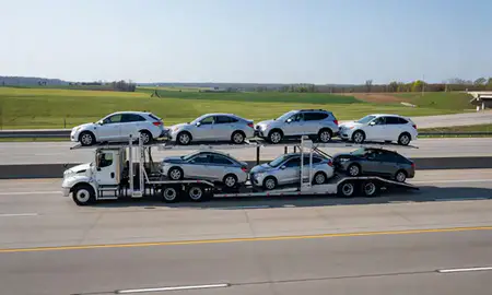 Multi-level car carrier on the highway to Beavercreek, Ohio, United States