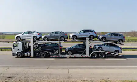 Multi-level car carrier on the highway to Canton, Ohio, United States