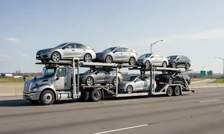 Multi-level car carrier on the highway to Cleveland Heights, Ohio, United States