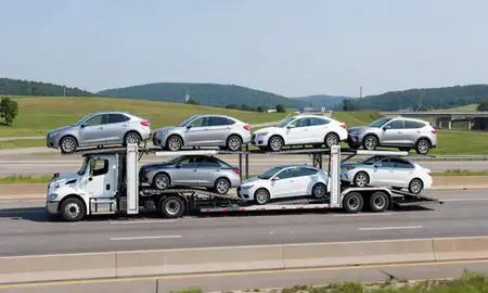 Multi-level car carrier on the highway to Cuyahoga Falls, Ohio, United States