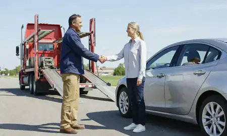 Vehicle owner beside their delivered car in Fairfield, Ohio, United States