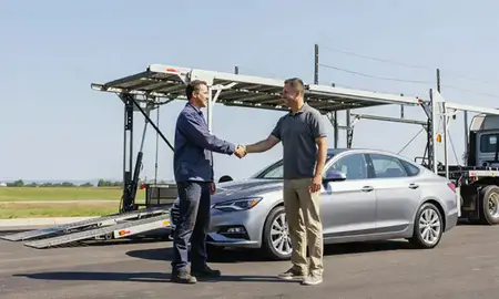 Vehicle owner beside their delivered car in Grove City, Ohio, United States