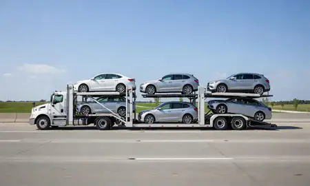 Multi-level car carrier on the highway to Hamilton, Ohio, United States
