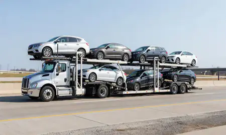 Multi-level car carrier on the highway to Huber Heights, Ohio, United States