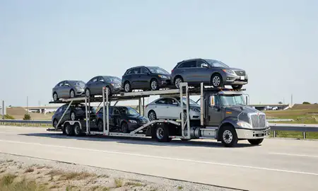 Multi-level car carrier on the highway to Lorain, Ohio, United States