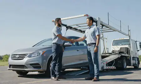 Vehicle owner beside their delivered car in Mentor, Ohio, United States