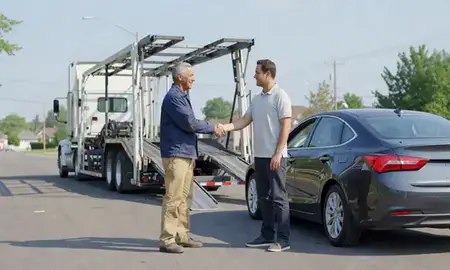 Vehicle owner beside their delivered car in Middletown, Ohio, United States