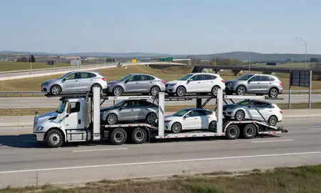 Multi-level car carrier on the highway to Newark, Ohio, United States