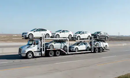 Multi-level car carrier on the highway to Altus, Oklahoma, United States