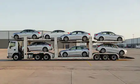 Car transporter parked in an industrial area of Altus, Oklahoma, United States