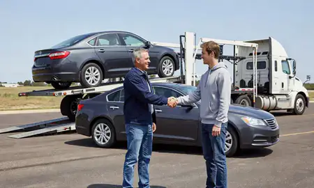 Vehicle owner beside their delivered car in Bartlesville, Oklahoma, United States