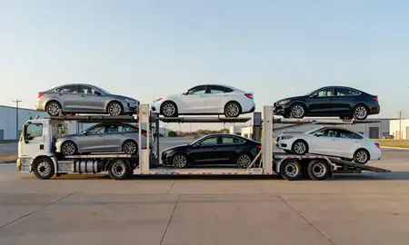 Car transporter parked in an industrial area of Bartlesville, Oklahoma, United States