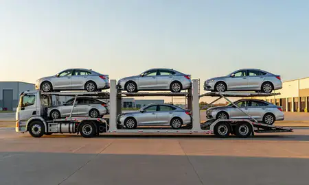 Car transporter parked in an industrial area of Bixby, Oklahoma, United States