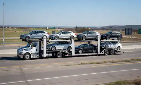 Multi-level car carrier on the highway to Claremore, Oklahoma, United States