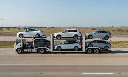Multi-level car carrier on the highway to Del City, Oklahoma, United States