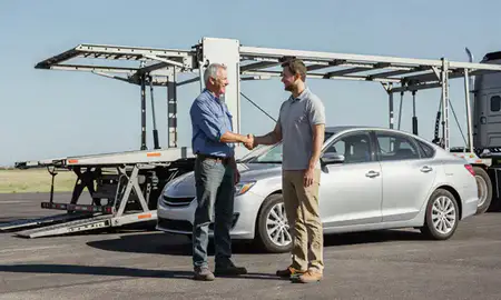 Vehicle owner beside their delivered car in El Reno, Oklahoma, United States
