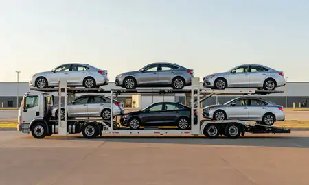 Car transporter parked in an industrial area of Mustang, Oklahoma, United States
