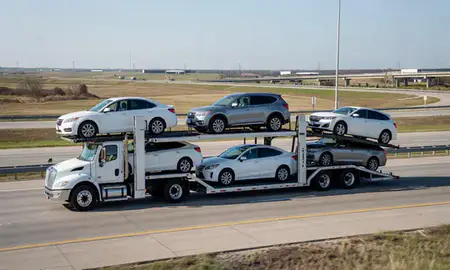 Multi-level car carrier on the highway to Owasso, Oklahoma, United States