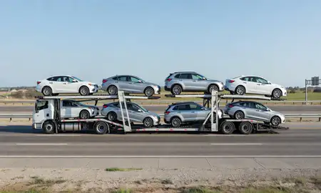 Multi-level car carrier on the highway to Sand Springs, Oklahoma, United States