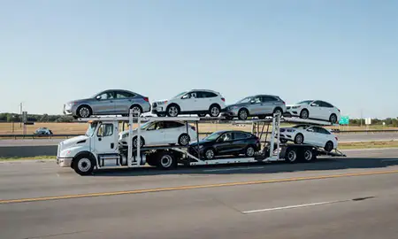 Multi-level car carrier on the highway to Sapulpa, Oklahoma, United States