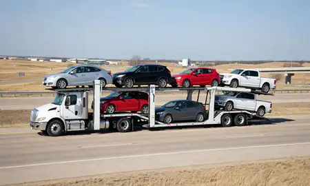 Multi-level car carrier on the highway to Stillwater, Oklahoma, United States
