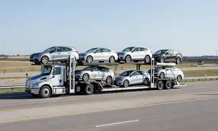 Multi-level car carrier on the highway to Yukon, Oklahoma, United States