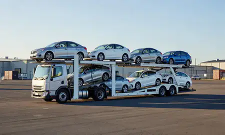 Car transporter loaded with vehicles in Oregon, United States