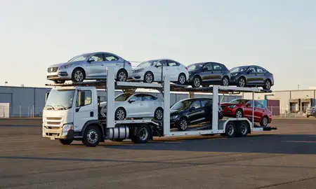 Car transporter loaded with vehicles in Albany, Oregon, United States