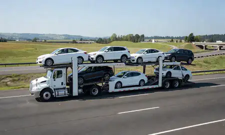 Multi-level car carrier on the highway to Aloha, Oregon, United States