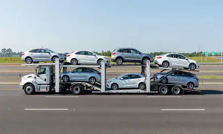 Multi-level car carrier on the highway to Beaverton, Oregon, United States