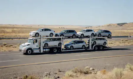 Multi-level car carrier on the highway to Bend, Oregon, United States