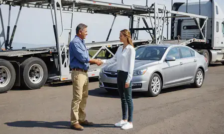 Vehicle owner beside their delivered car in Bend, Oregon, United States
