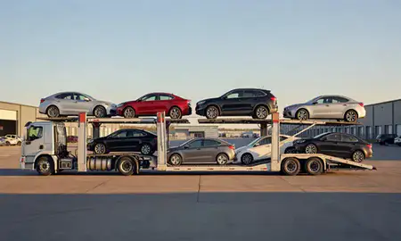 Car transporter parked in an industrial area of Bethany, Oregon, United States