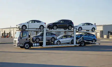 Car transporter loaded with vehicles in Corvallis, Oregon, United States